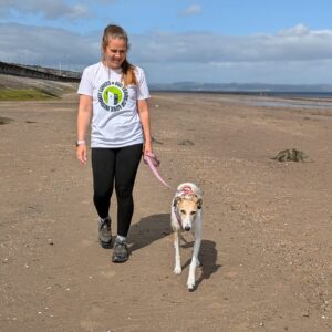 person walking with dog