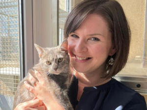 Former CEO, Lindsay, cuddling a cat